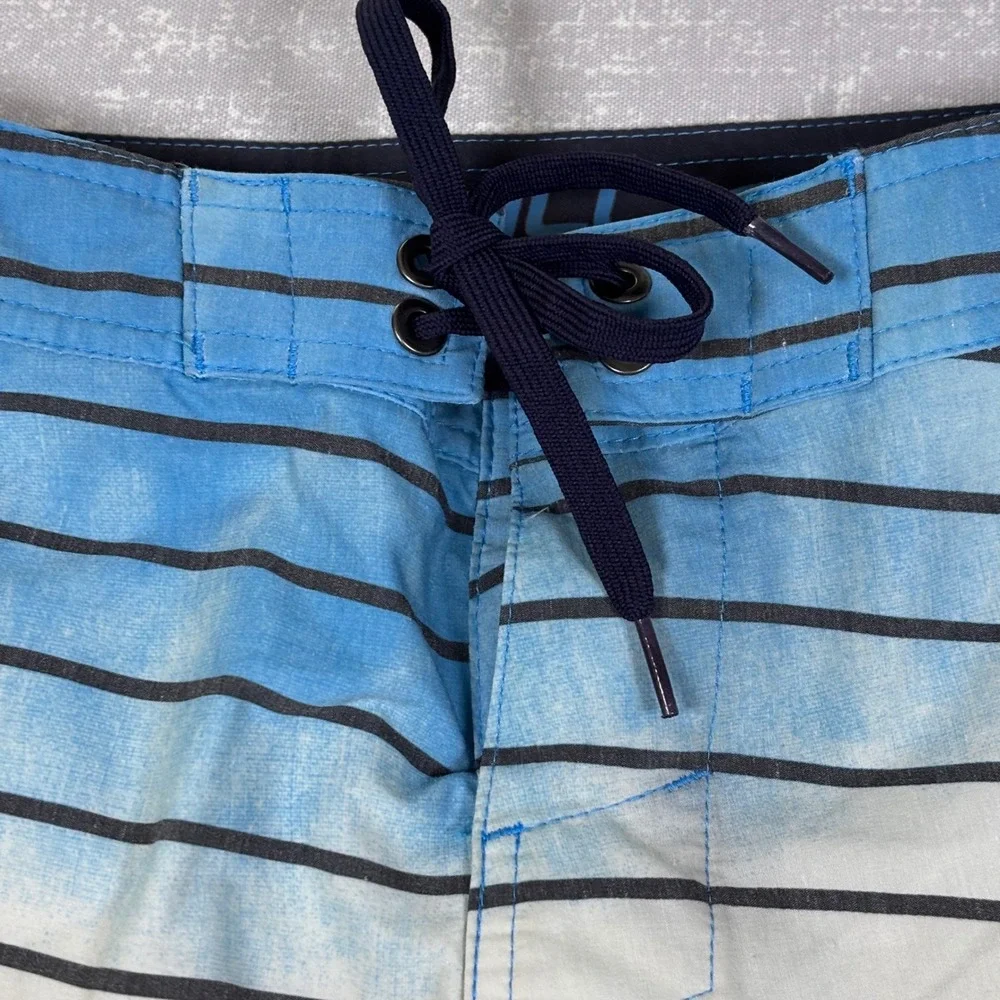 Lot of 2 O'Neill Mens Board Shorts Size 30 Blue Floral & Red Striped Swim Trunks